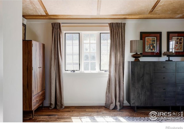 unfurnished bedroom featuring hardwood / wood-style flooring