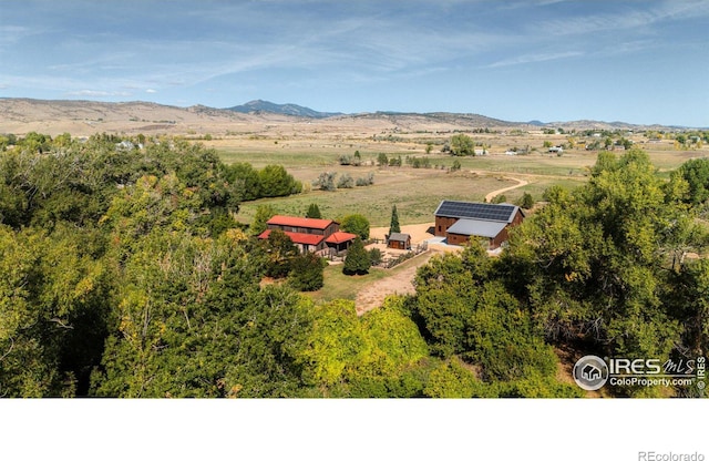 bird's eye view with a mountain view