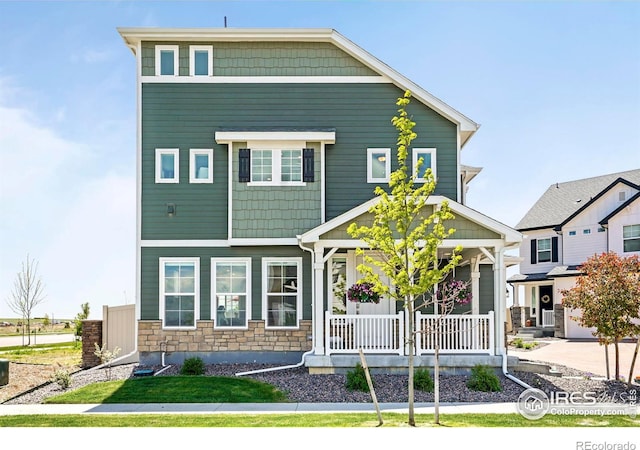 view of front of property featuring covered porch