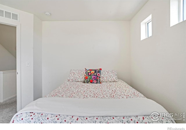 bedroom featuring carpet flooring