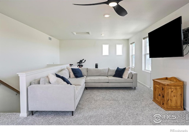 living room featuring light carpet