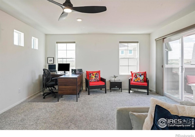 home office featuring ceiling fan and carpet