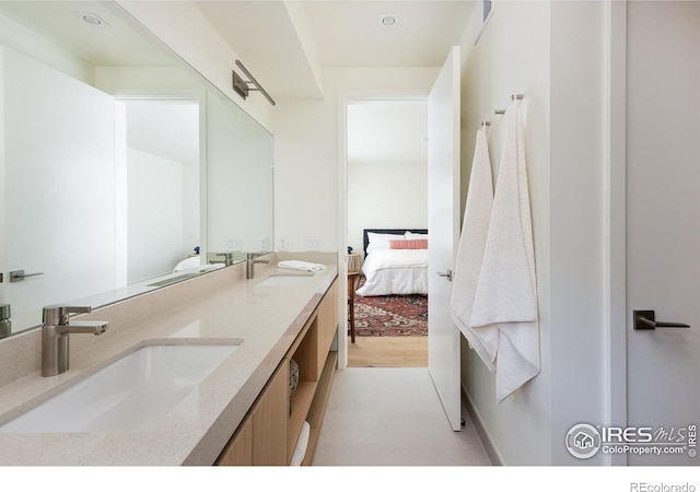 bathroom featuring hardwood / wood-style flooring and vanity