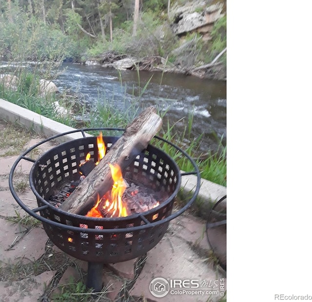2392 W US Highway 34, Drake, CO 80515 - exterior view of a fire pit