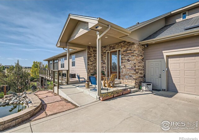 entrance to property featuring a garage