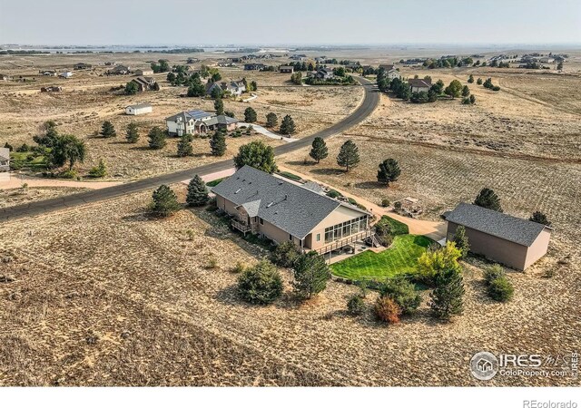 bird's eye view with a rural view