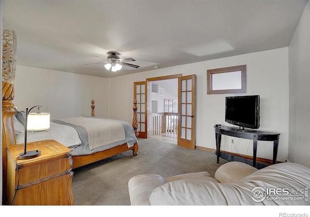 carpeted bedroom with ceiling fan and french doors