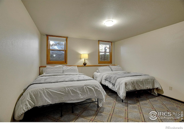 bedroom with a textured ceiling