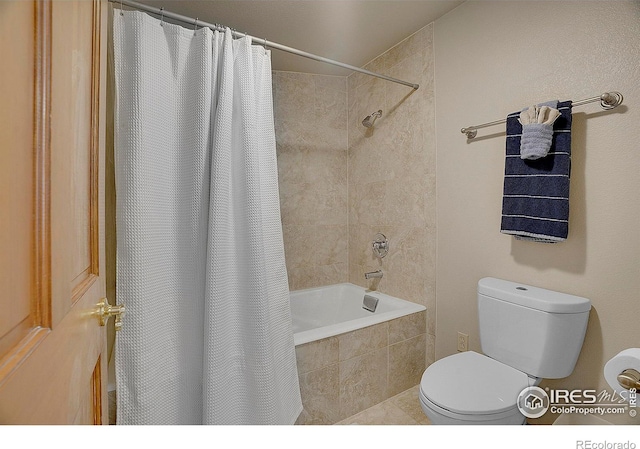 bathroom with shower / bath combination with curtain and toilet