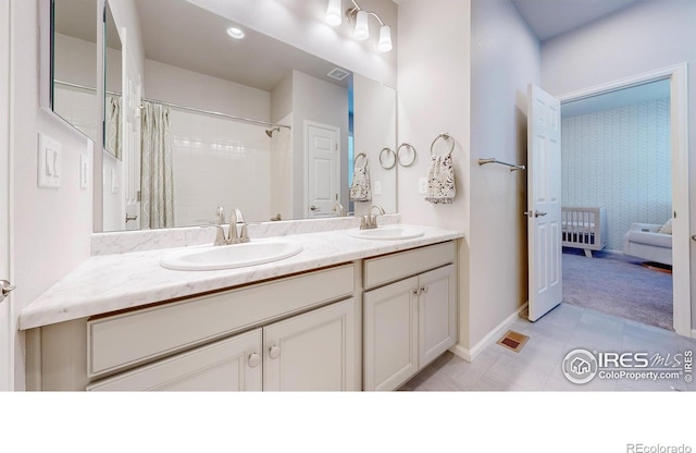 bathroom featuring radiator heating unit, vanity, and a shower with curtain