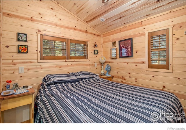 bedroom featuring wooden ceiling, vaulted ceiling, and wooden walls