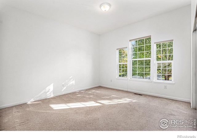 view of carpeted spare room