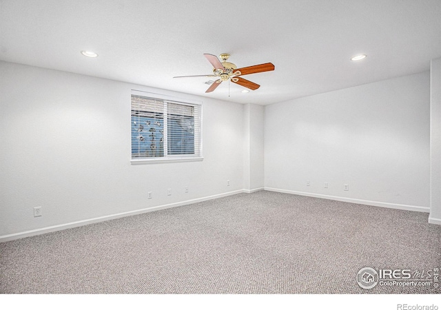 unfurnished room with carpet floors and ceiling fan