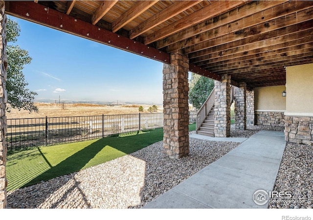 view of patio / terrace with a rural view