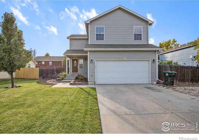 traditional-style home featuring an attached garage, fence, a front lawn, and concrete driveway