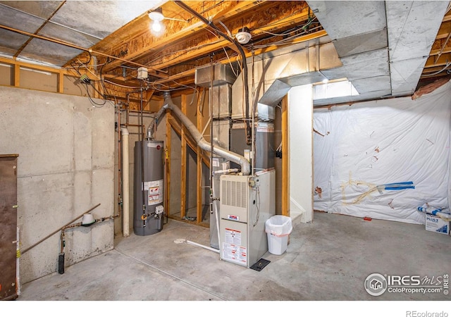 utility room with water heater and heating unit