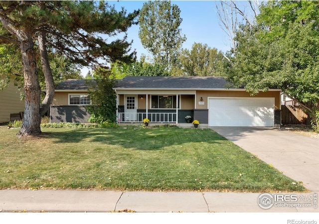 ranch-style home with a porch, a front yard, and a garage