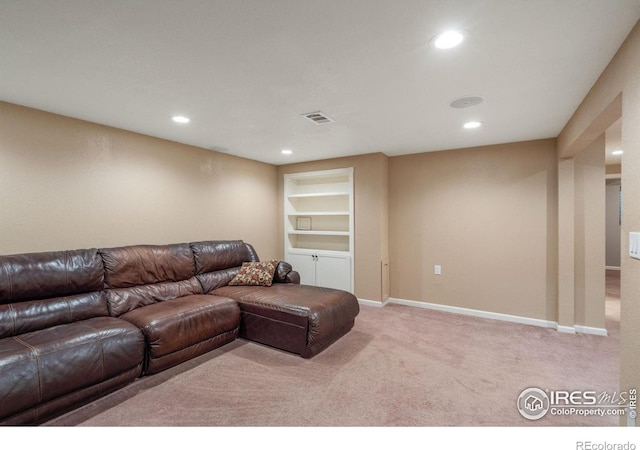 living room featuring light carpet