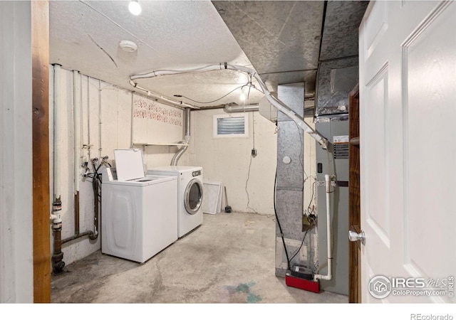 washroom featuring washer and dryer