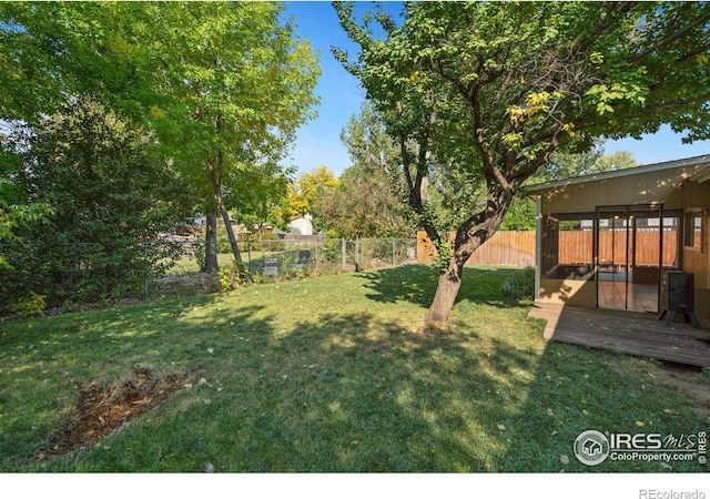 view of yard featuring a deck