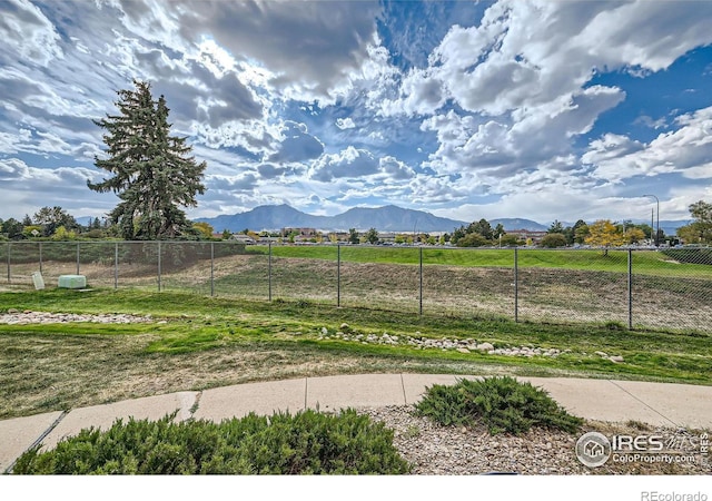 exterior space with a mountain view and a rural view