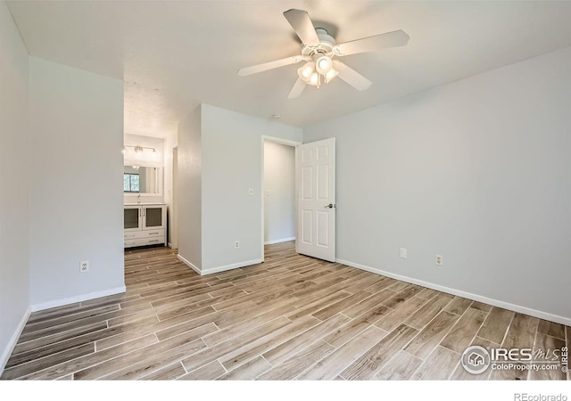 unfurnished bedroom featuring ceiling fan and light hardwood / wood-style flooring