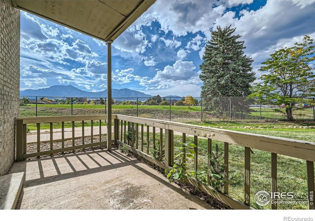 balcony featuring a mountain view