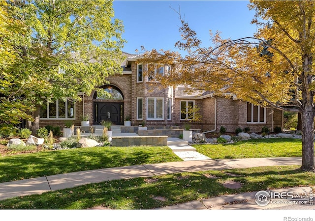 view of front of house with a front yard