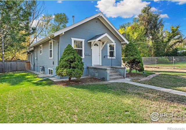 view of front of home with a front lawn