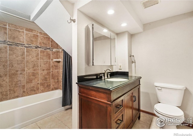 full bathroom with vanity, shower / bathtub combination with curtain, tile patterned flooring, vaulted ceiling, and toilet