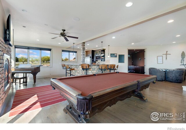 recreation room with light hardwood / wood-style floors, billiards, and ceiling fan