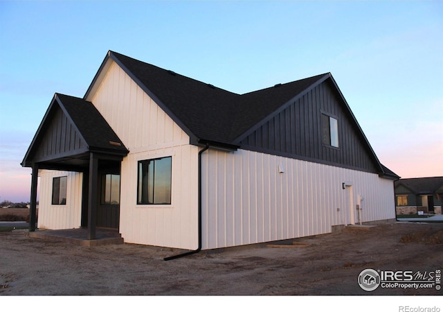 view of property exterior at dusk