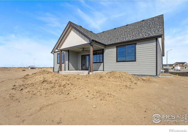 view of front of house featuring a patio, central AC, and a ceiling fan