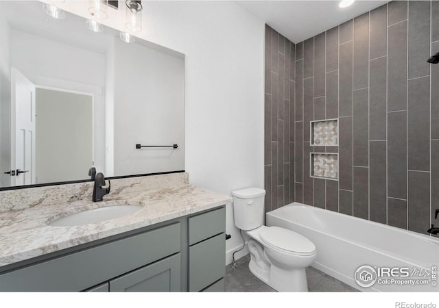 448 Cache Ave, Fort Morgan, CO 80701 - full bath featuring toilet, vanity, and shower / washtub combination