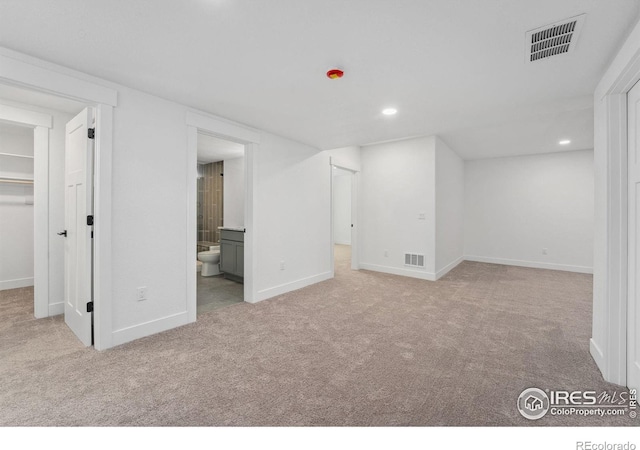 448 Cache Ave, Fort Morgan, CO 80701 - interior space featuring baseboards, carpet flooring, and visible vents