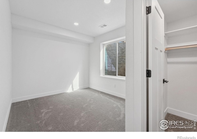 448 Cache Ave, Fort Morgan, CO 80701 - unfurnished bedroom featuring baseboards, recessed lighting, and carpet