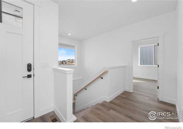 448 Cache Ave, Fort Morgan, CO 80701 - foyer with baseboards, wood finished floors, and recessed lighting