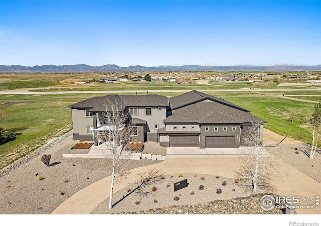 view of front of house with a mountain view