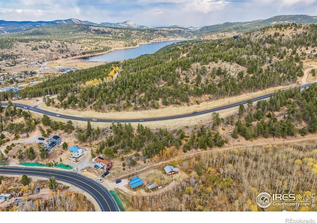 bird's eye view featuring a water and mountain view