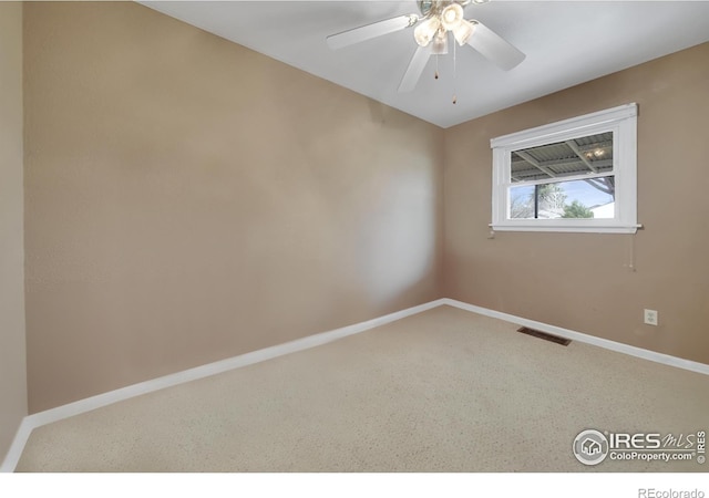 empty room featuring ceiling fan