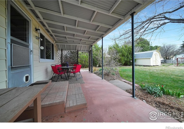 view of patio / terrace with a storage unit