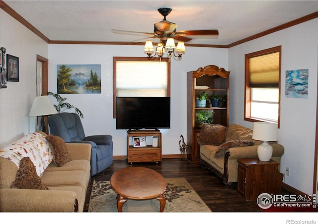 living room with crown molding, dark hardwood / wood-style floors, and ceiling fan