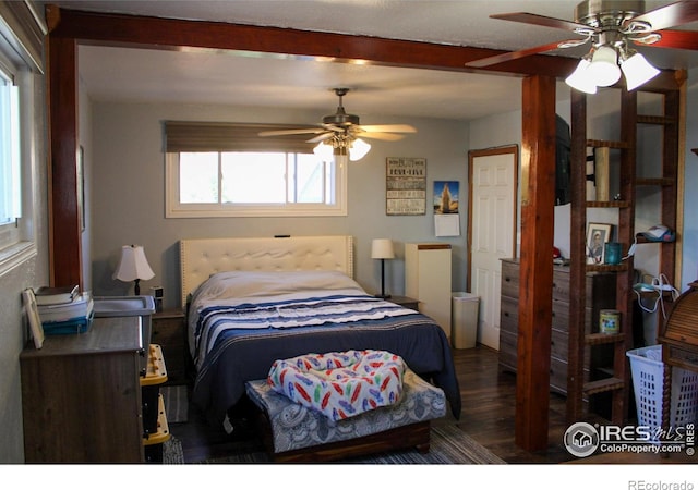 bedroom featuring dark wood-type flooring and ceiling fan