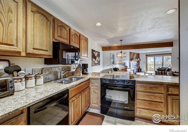 kitchen featuring sink, light tile patterned floors, a textured ceiling, black appliances, and a notable chandelier