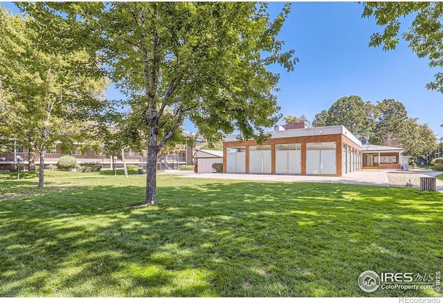 view of yard featuring a garage