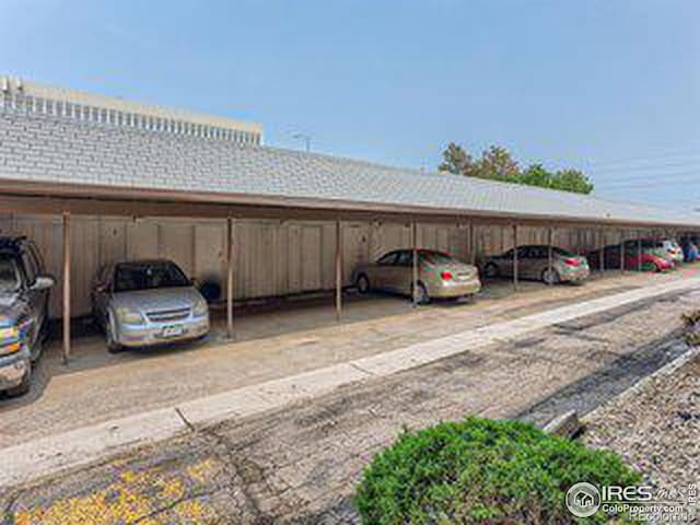 view of car parking with a carport