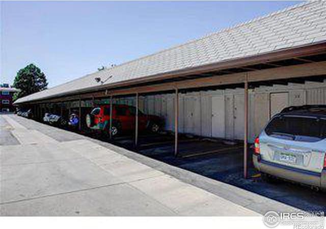 view of parking with a carport