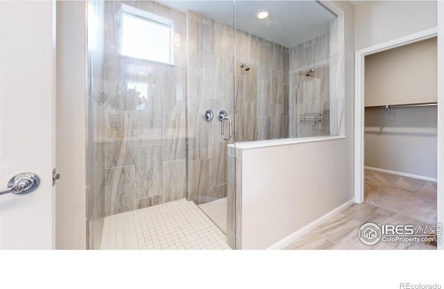 3107 Deering Lake Dr, Loveland, CO 80538 - full bath with baseboards and a stall shower