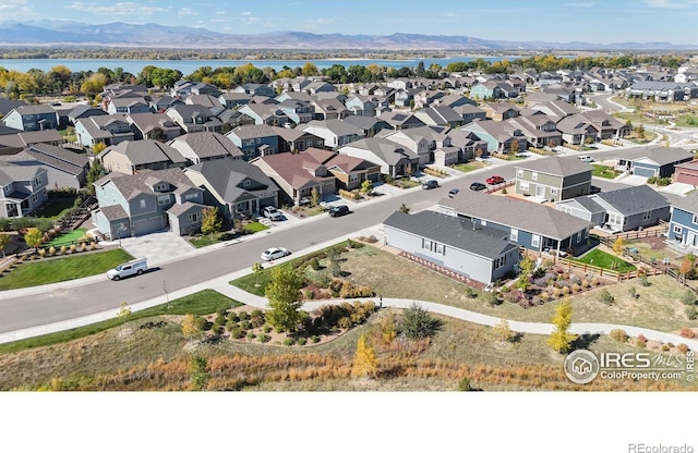 3107 Deering Lake Dr, Loveland, CO 80538 - bird's eye view with a water and mountain view and a residential view