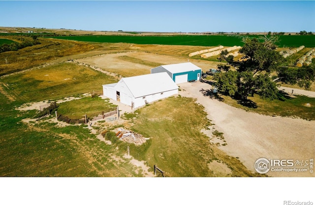 birds eye view of property featuring a rural view